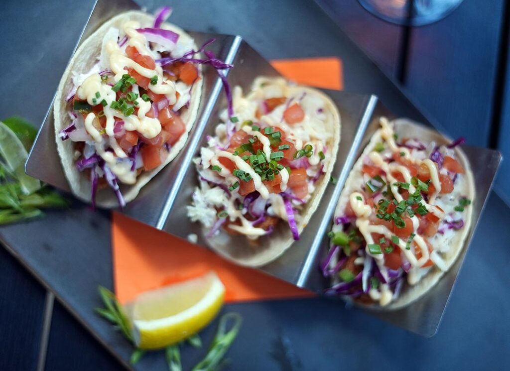 Three fish tacos on the terrace of Old Montreal's Restaurant le Polisson 171 St-Paul Street Ouest